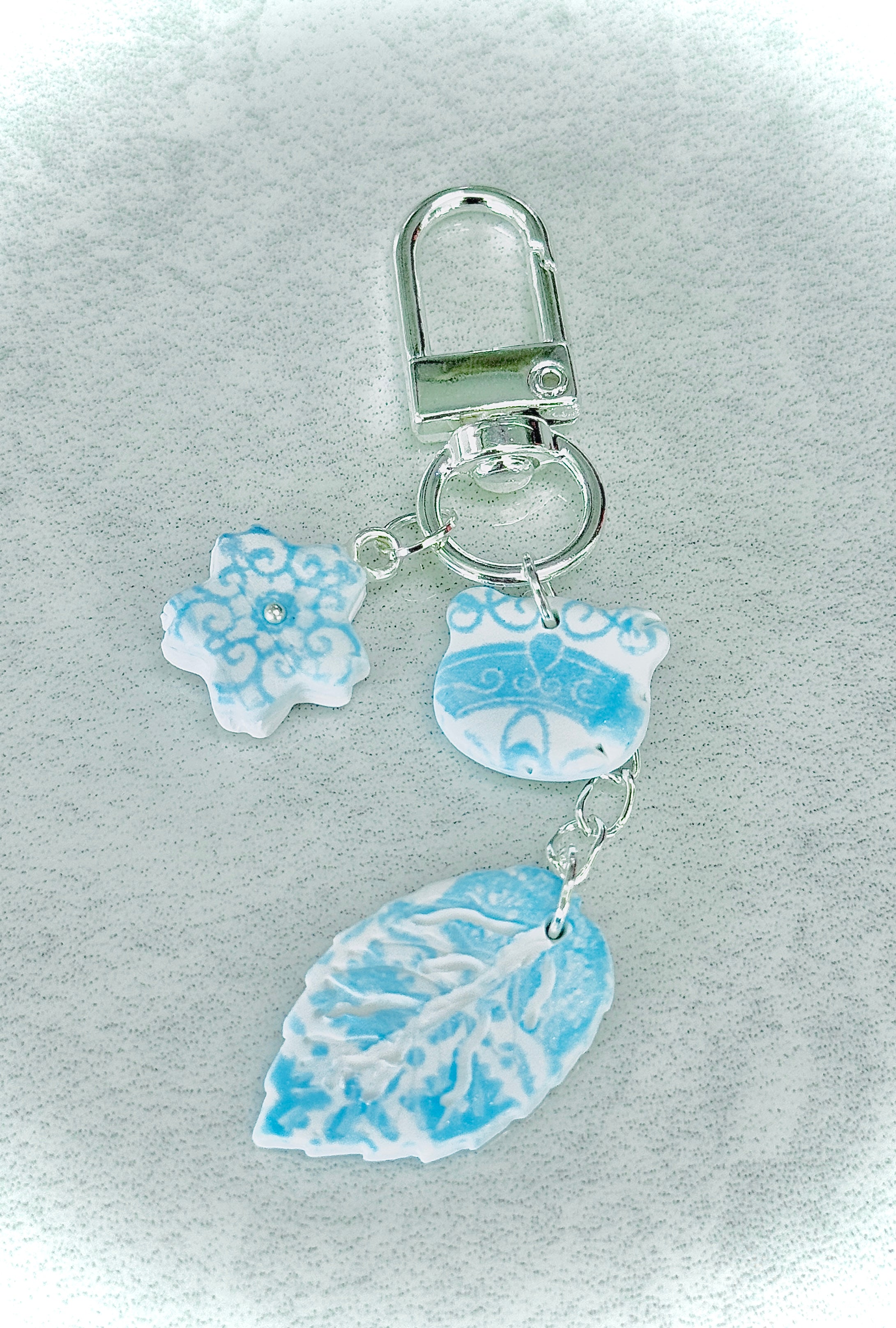 A034. Gilded breeze key charm (bear)