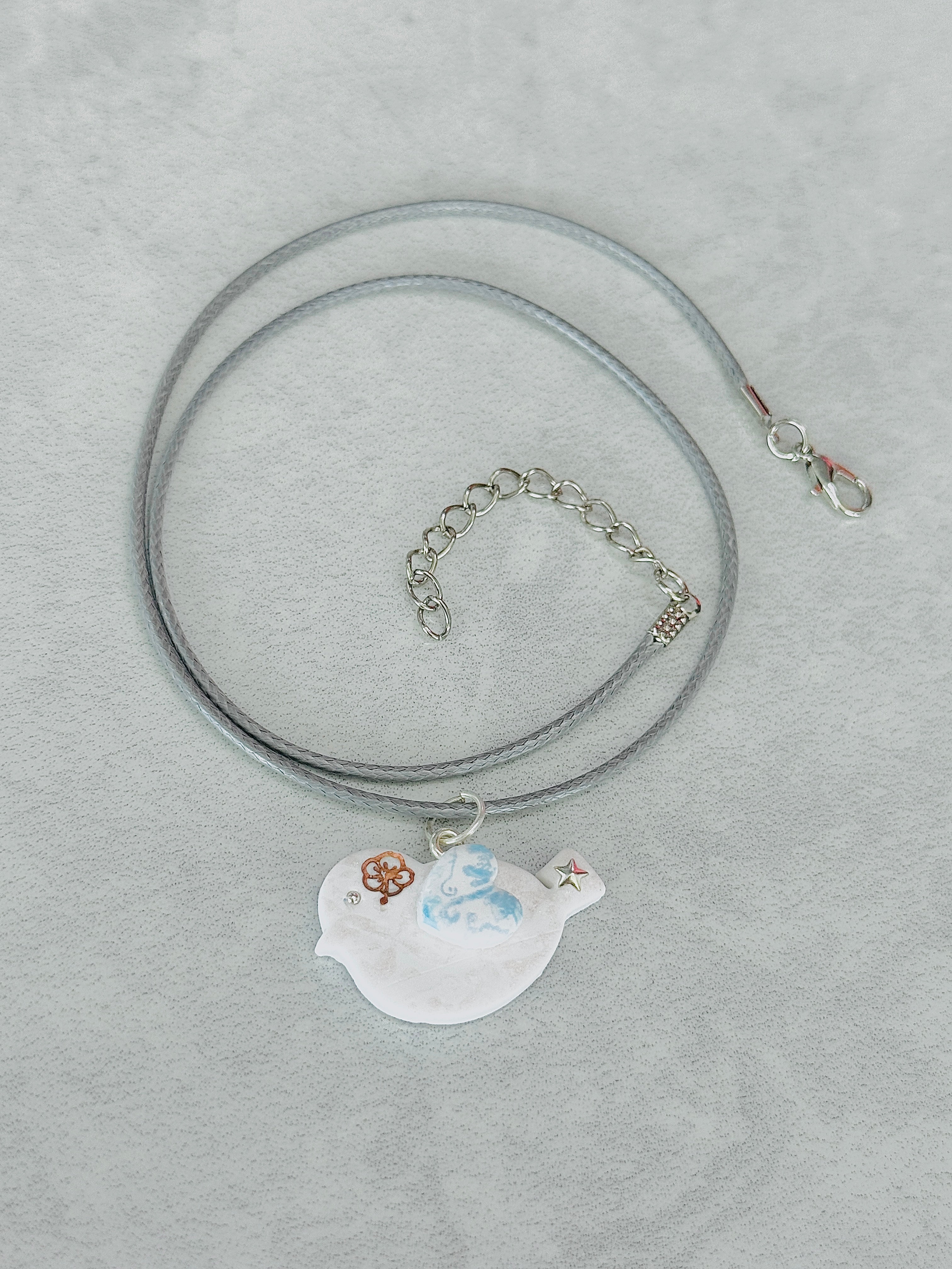 A037. Gilded breeze necklace (winter bird)