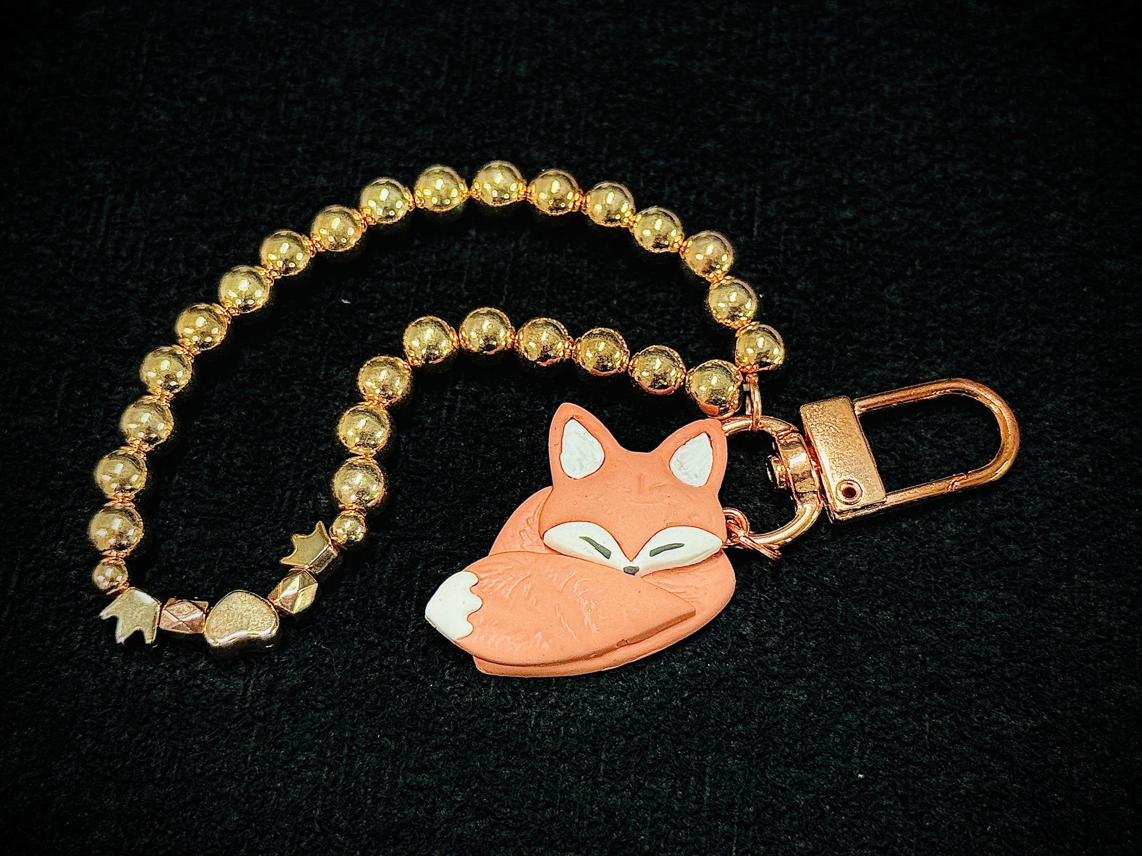 A050. Glamour Fox key charm (woody brown)