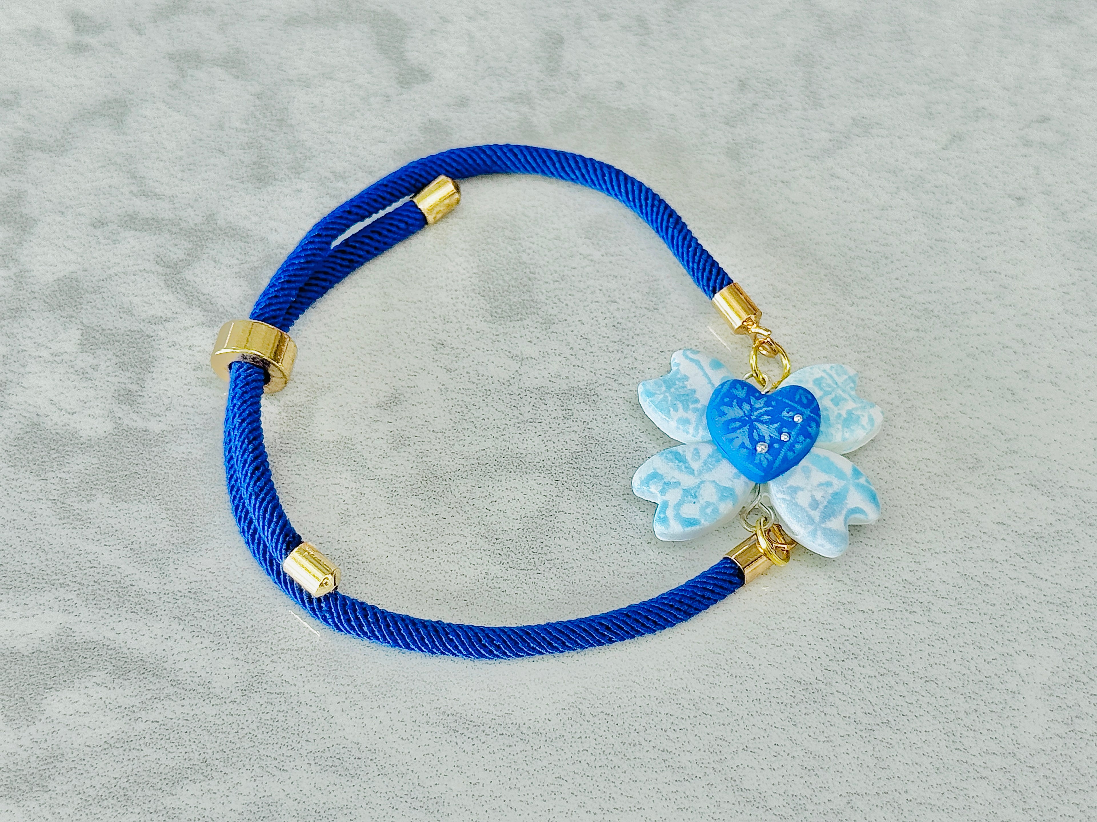 A036. Gilded breeze bracelet (heart flower)