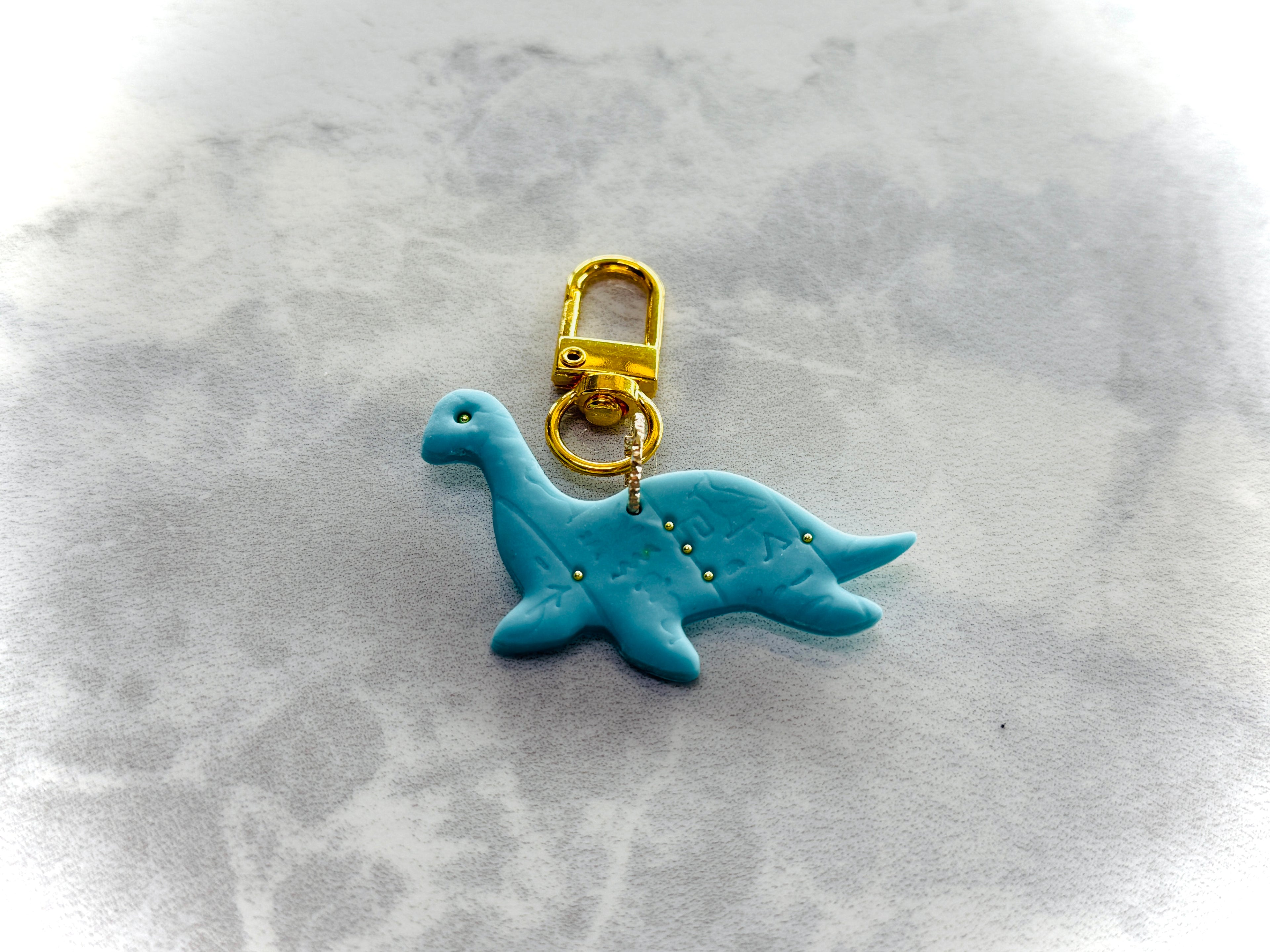 A077. Dinosaur key charm (1)